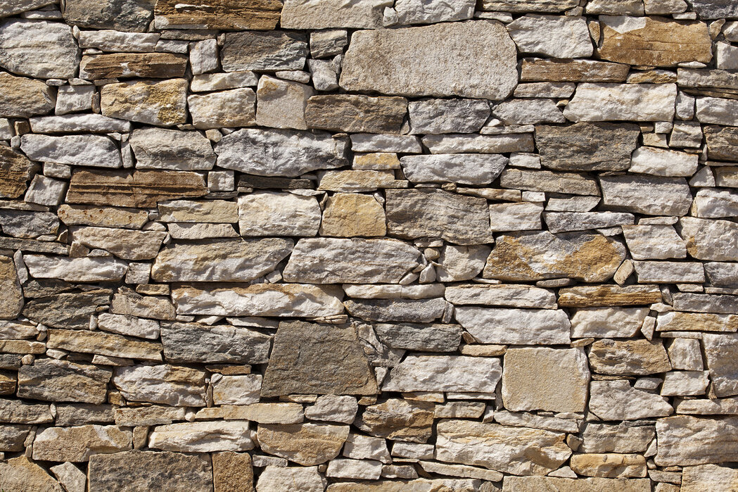 stone-wall-background Fototapet Fundal de perete de piatră - imagine 1
